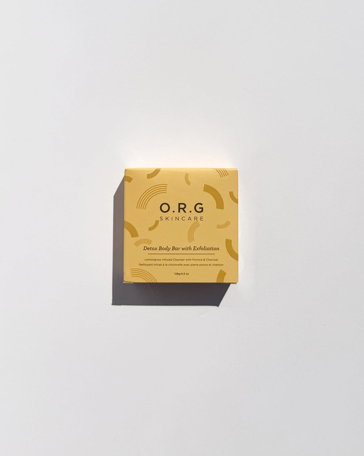 O.R.G Skincare Detox Body Bar is a hand-poured exfoliating body cleanser made with bamboo charcoal, volcanic pumice, and lemongrass oil to cleanse away daily grime while physically exfoliating dry, rough surface buildup.