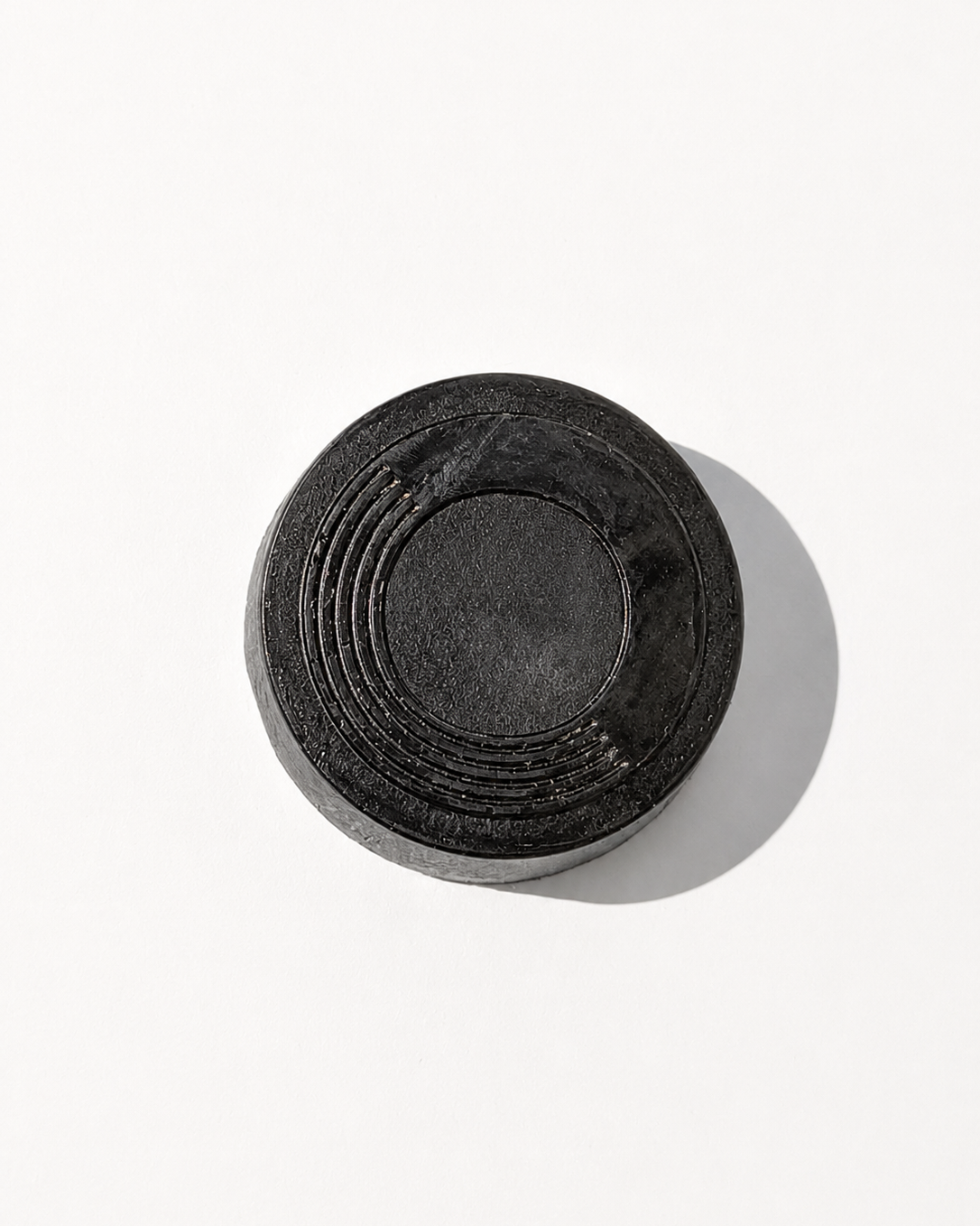 O.R.G Skincare Detox Body Bar is a hand-poured exfoliating body cleanser made with bamboo charcoal, volcanic pumice, and lemongrass oil to cleanse away daily grime while physically exfoliating dry, rough surface buildup.
